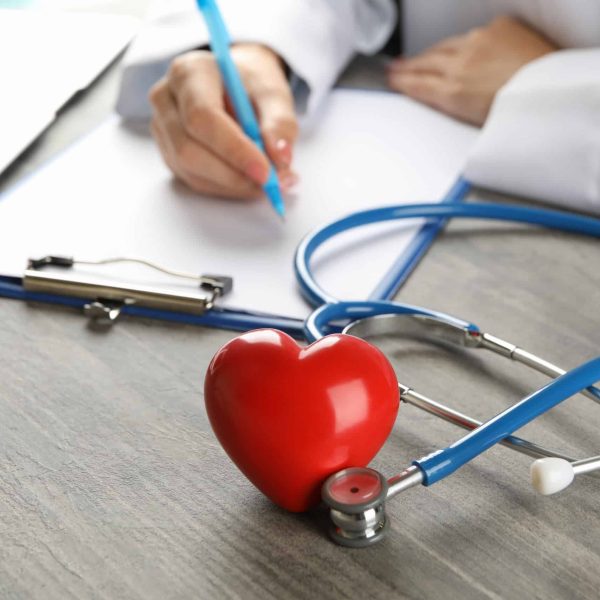 medical-concept-with-doctor-stethoscope-and-heart-TYJVFL9-scaled